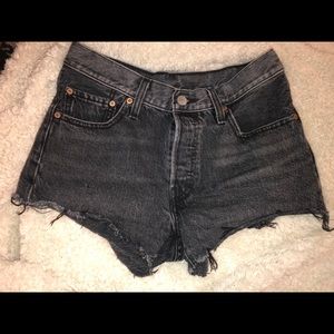 Distressed high waisted Levi’s shorts.